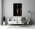 Close-up detail of giraffe head with body dissolving into amber smoke