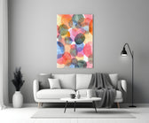 Close-up detail of overlapping pink, teal, and ochre watercolor circles