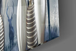 Vases and Trees artwork anchoring a wall with moody decorative palette
