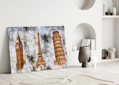 Close-up detail of Big Ben, Eiffel Tower, and Pisa Tower in grunge wash