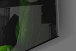 Snake artwork anchoring a wall with moody edgy palette
