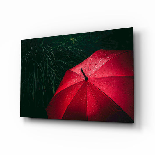 Red Umbrella glass wall art displayed above a console in a designer interior
