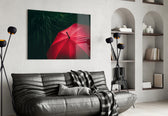 Red Umbrella glass wall art styled above a console in a foyer