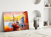 Close-up detail of scarlet and ochre buildings with moored fishing boats