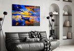 Dark Blue Sunset glass wall art styled above a desk in an introspective study