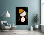 Abstract Acorn glass wall art styled above a desk in an editorial study