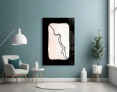 Abstract Distinction glass wall art styled above a desk in an editorial study