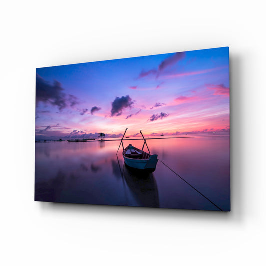 Sunset on the Boat glass wall art displayed above a console in a designer interior