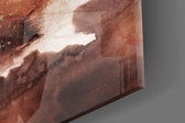 Abstract Earth artwork anchoring a wall with luxe warm palette
