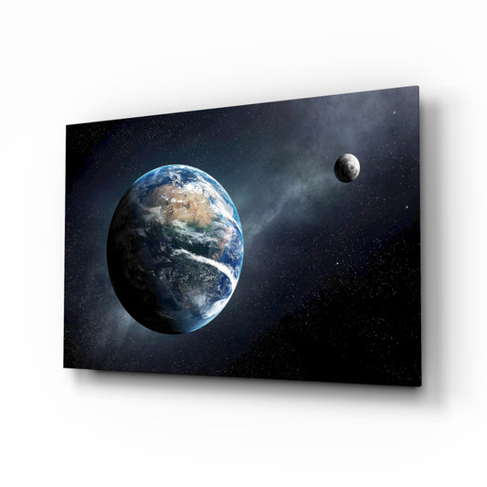 Earth glass wall art displayed above a console in a designer interior