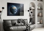 Earth glass wall art styled above a desk in a cosmic child's room
