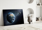 Close-up detail of cobalt Earth with small grey moon in starfield