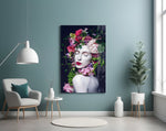 Flower and Woman glass wall art styled above a vanity in a powder room