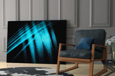 Blue Lights glass print enhancing a lounge with editorial drama