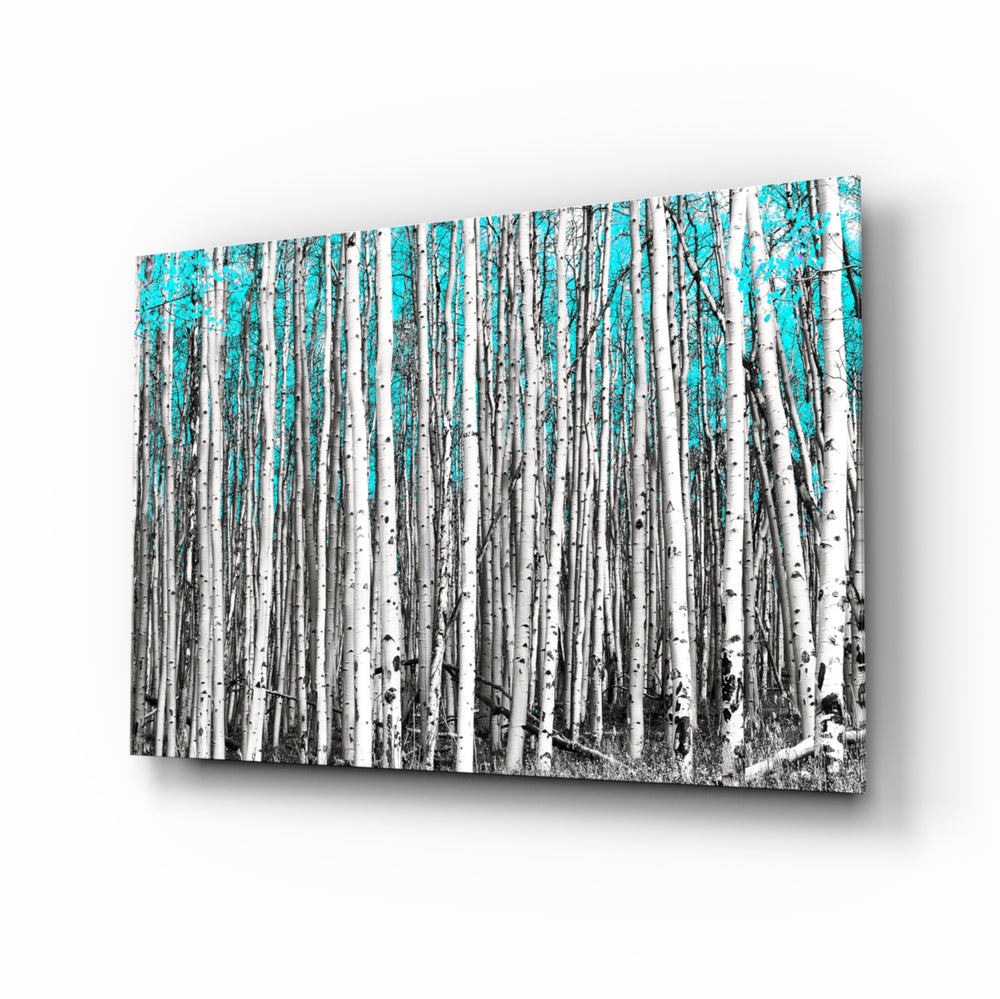 Blue Forest glass wall art displayed above a console in a designer interior