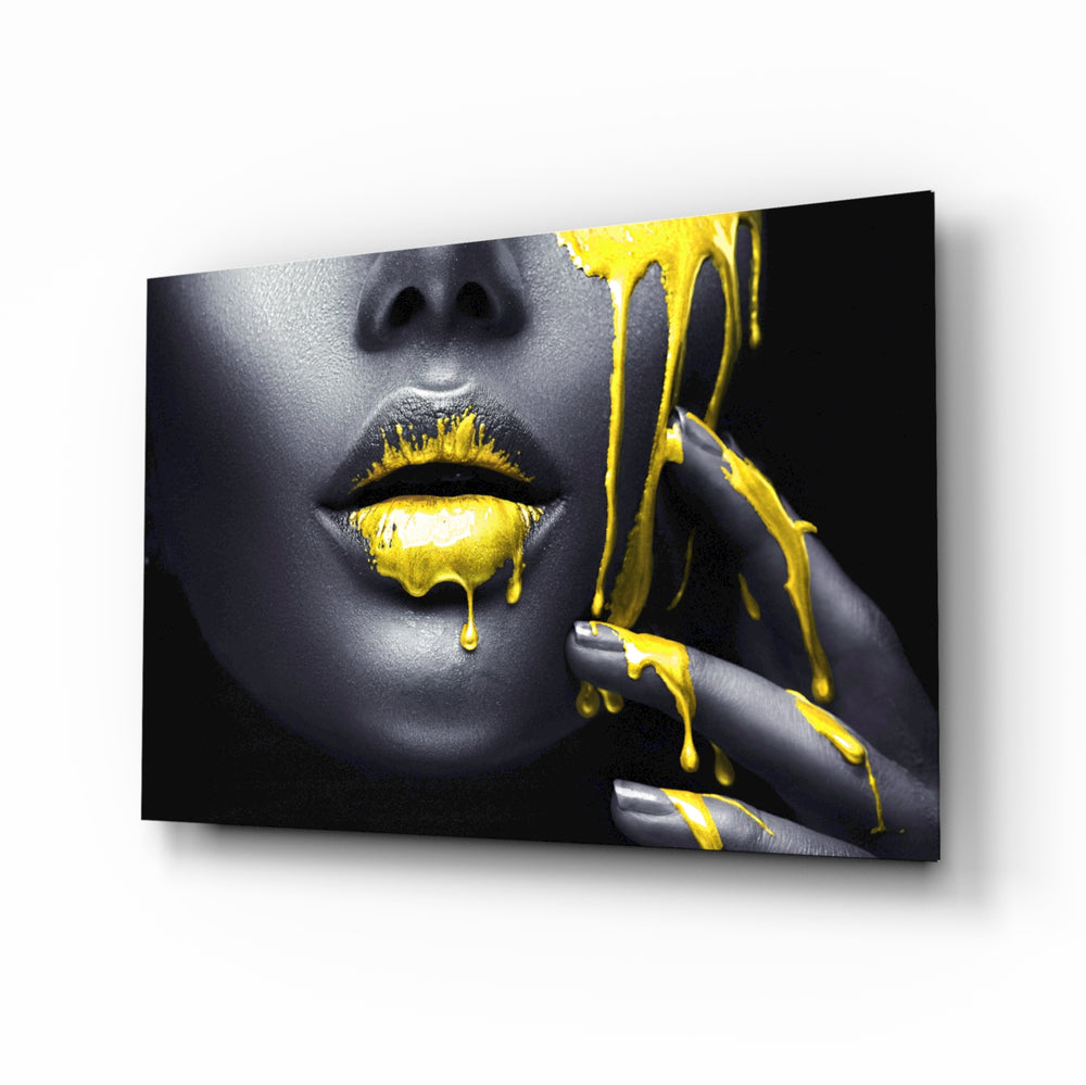 Yellow and Woman glass wall art displayed above a console in a designer interior