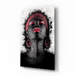 Woman and Red glass wall art displayed above a console in a designer interior
