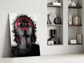 Woman and Red glass print enhancing a lounge with editorial drama