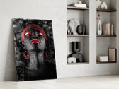 Woman and Red glass print enhancing a lounge with after-hours drama