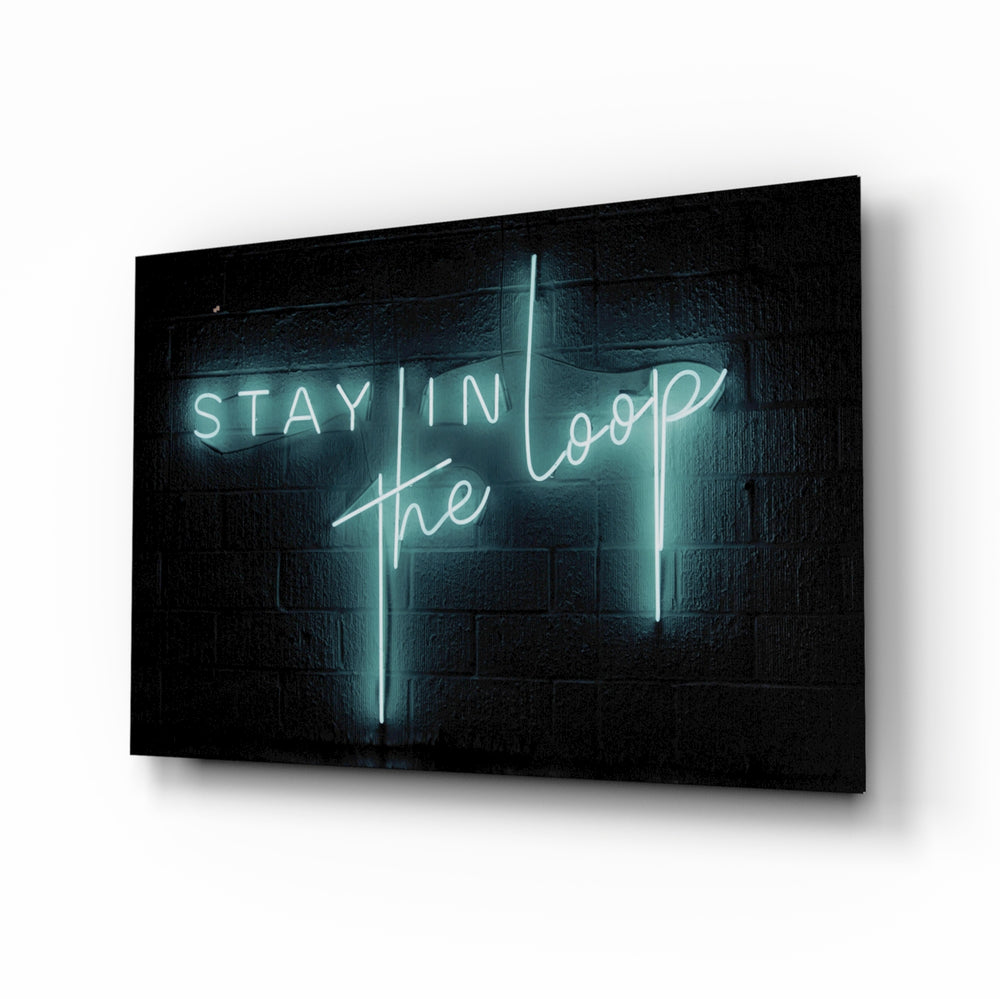 Stay in the Loop glass wall art displayed above a console in a designer interior