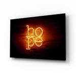 Hope glass wall art displayed above a console in a designer interior
