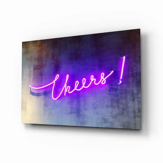 Cheers glass wall art displayed above a console in a designer interior