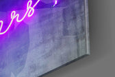 Cheers artwork anchoring a wall with bold festive palette