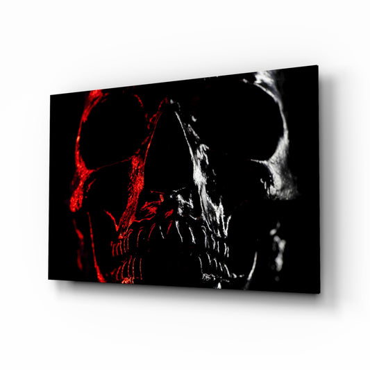 Skull glass wall art displayed above a console in a designer interior
