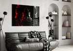 Skull glass wall art styled above a desk in an introspective study