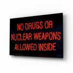 No Drugs glass wall art displayed above a console in a designer interior
