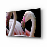 Flamingo glass wall art displayed above a console in a designer interior