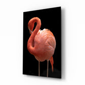 Flamingo glass wall art displayed above a console in a designer interior