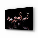 Flamingos glass wall art displayed above a console in a designer interior