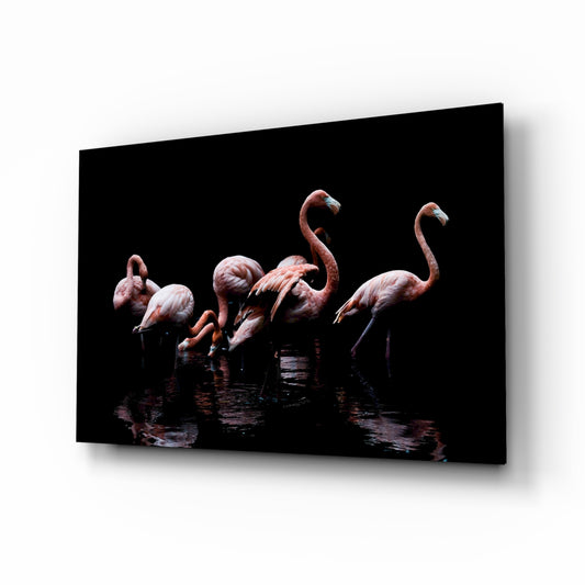 Flamingos glass wall art displayed above a console in a designer interior
