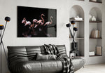Flamingos glass wall art styled above a vanity in a powder room