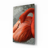 Flamingo glass wall art displayed above a console in a designer interior