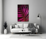 Close-up detail of magenta fronds and shadow void