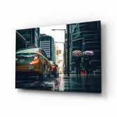 Rain in the City glass wall art displayed above a console in a designer interior