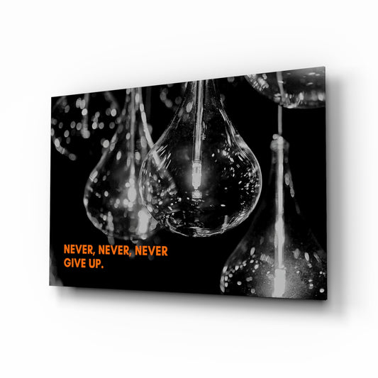 Never Give Up glass wall art displayed above a console in a designer interior