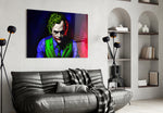 Joker glass wall art styled above a desk in a teen room