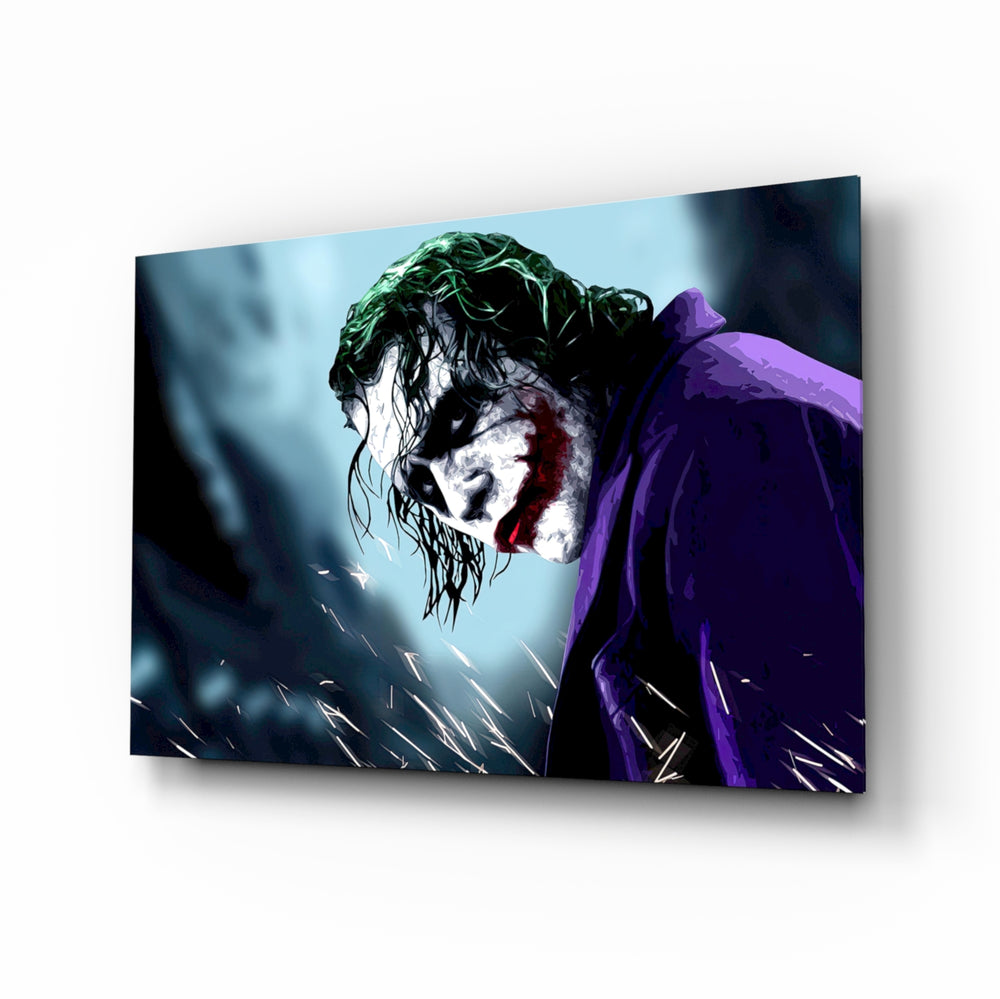 Joker glass wall art displayed above a console in a designer interior