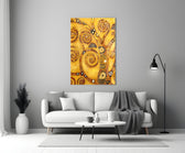 Close-up detail of gilded spirals on amber canvas