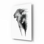 Elephant glass wall art displayed above a console in a designer interior