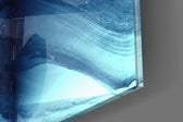 Blue Serenity artwork anchoring a wall with calm coastal palette