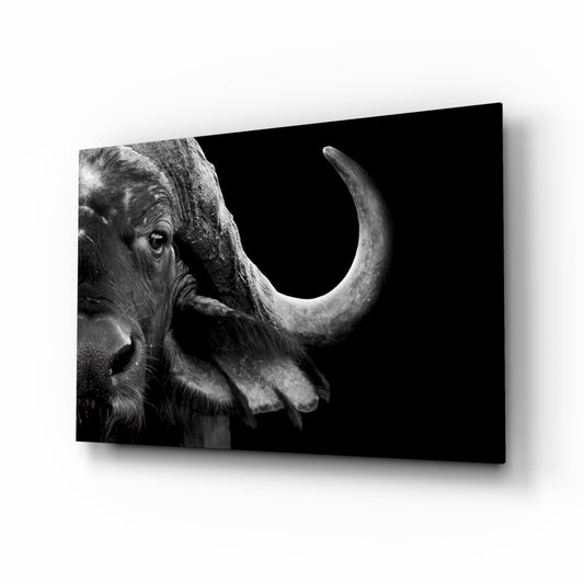 Bison glass wall art displayed above a console in a designer interior