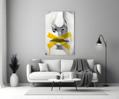 Close-up detail of dripping yellow X across charcoal lips