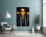 Gold Woman glass wall art styled above a vanity in a powder room
