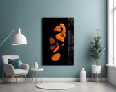 Existing glass wall art styled above a desk in an introspective study