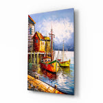 Boats on the Shore glass wall art displayed above a console in a designer interior