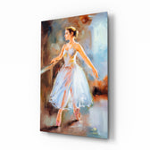 Ballerina glass wall art displayed above a console in a designer interior